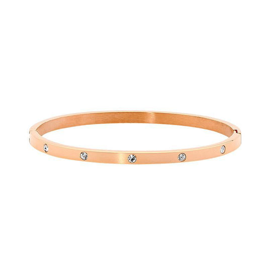 Ellani rose gold stainless steel oval hinged bangle, set with five cubic zirconia along the bangle. Width: 4mm, inside diameter: 62mm x 52mm.